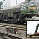 A vehicle carries the Dongfeng-21, a medium-range conventional ballistic missile.